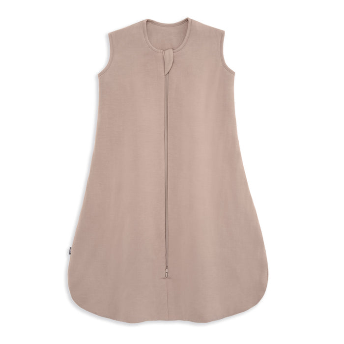 The HALO SuperSoft Bamboo Wearable Blanket TOG 1.5 is a sleeveless, light brown sleep sack made from buttery bamboo with a wide bottom and a 2-way zipper from neck to hem. Its lightweight, soft fabric ensures ultimate comfort for your baby.
