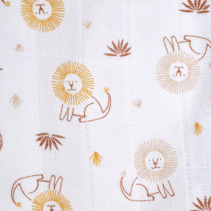 The HALO Swaddle 100% Cotton Muslin TOG 1.5 features a white fabric with yellow and brown cartoon lions and abstract plants—ideal as an adjustable swaddle or SleepSack Swaddle for your baby.