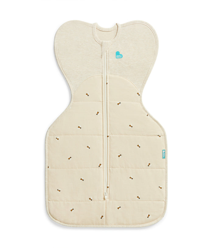 Beige baby sleeping bag with subtle pattern on a white background