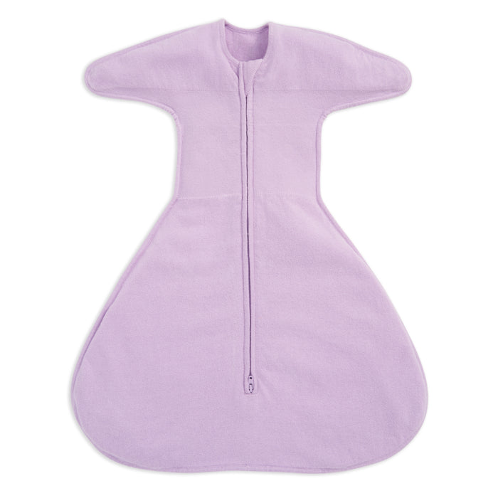 The HALO SwaddleStretch™ Newborn Swaddle TOG 0.5 in light purple has a front zipper, wide wings, and a roomy bottom, offering swaddle comfort while letting your baby move freely.