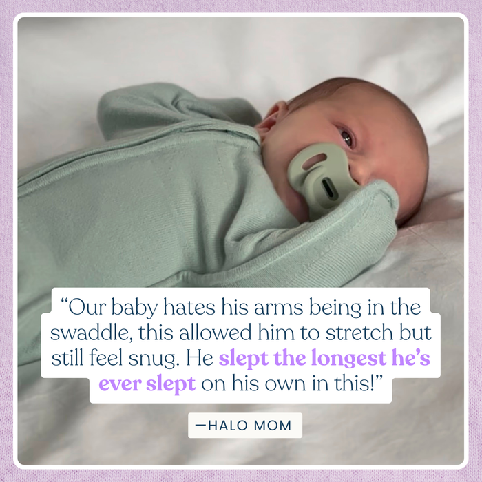 A baby wrapped in a green HALO SwaddleStretch™ Newborn Swaddle TOG 0.5 lies on a bed with a green pacifier, next to a testimonial about the swaddle’s comfort and effectiveness in helping the baby sleep.
