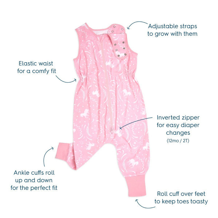 The HALO Toddler 100% Cotton TOG 0.5 jumpsuit in pink with white patterns offers adjustable straps, an elastic waist for comfort, an inverted zipper for easy diaper changes, and rollable cuffs for warmth, ensuring better sleep for your little one.