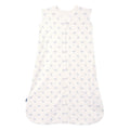 The HALO Wearable Blanket is a 100% cotton, TOG 0.5 sleeveless sleep sack with a front zipper and light background, adorned with a breathable pattern of small blue flowers for safe and stylish sleep.