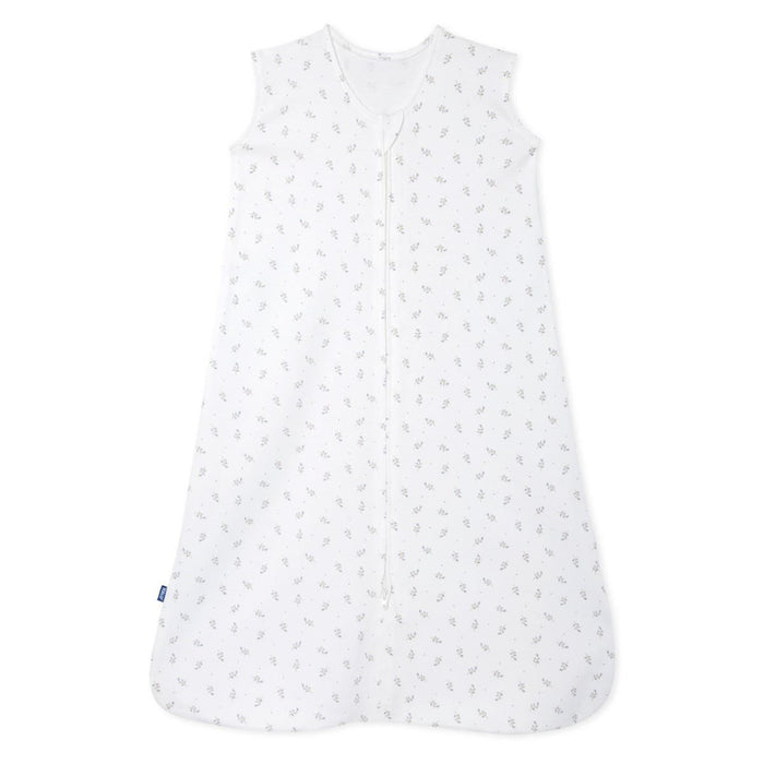 A sleeveless white HALO Wearable Blanket 100% Cotton TOG 0.5 features a subtle print of tiny grey leaves. It ensures safe sleep with a convenient front zipper and has a label on the left side, laid flat against a plain background.
