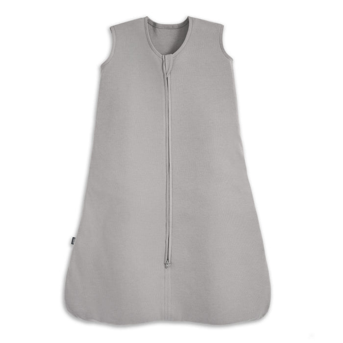 The HALO Wearable Blanket 100% Organic Cotton TOG 0.5 is a light gray, sleeveless baby sleep sack with a front zipper from neck to bottom, shown on a white background. Ideal for safe sleep.