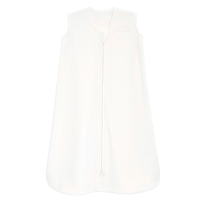 The HALO Wearable Blanket Micro-Fleece TOG 1.0 is a sleeveless white blanket with a full front zipper, made from soft fabric. Designed for safe sleep, it ensures your little ones comfort and warmth throughout the night.